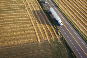 Semi truck driving through rural America.